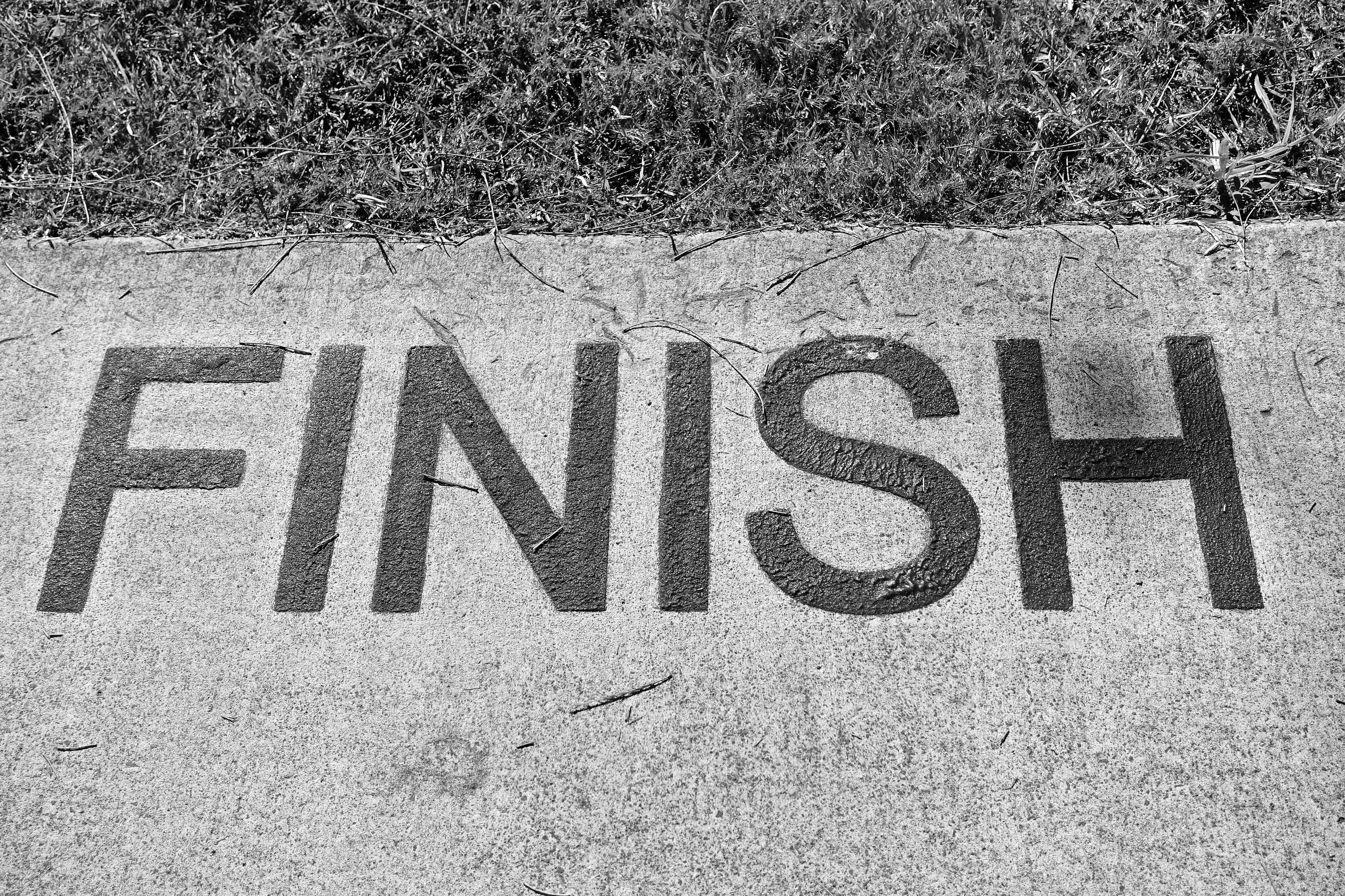 The word ‘FINISH’ painted on a path